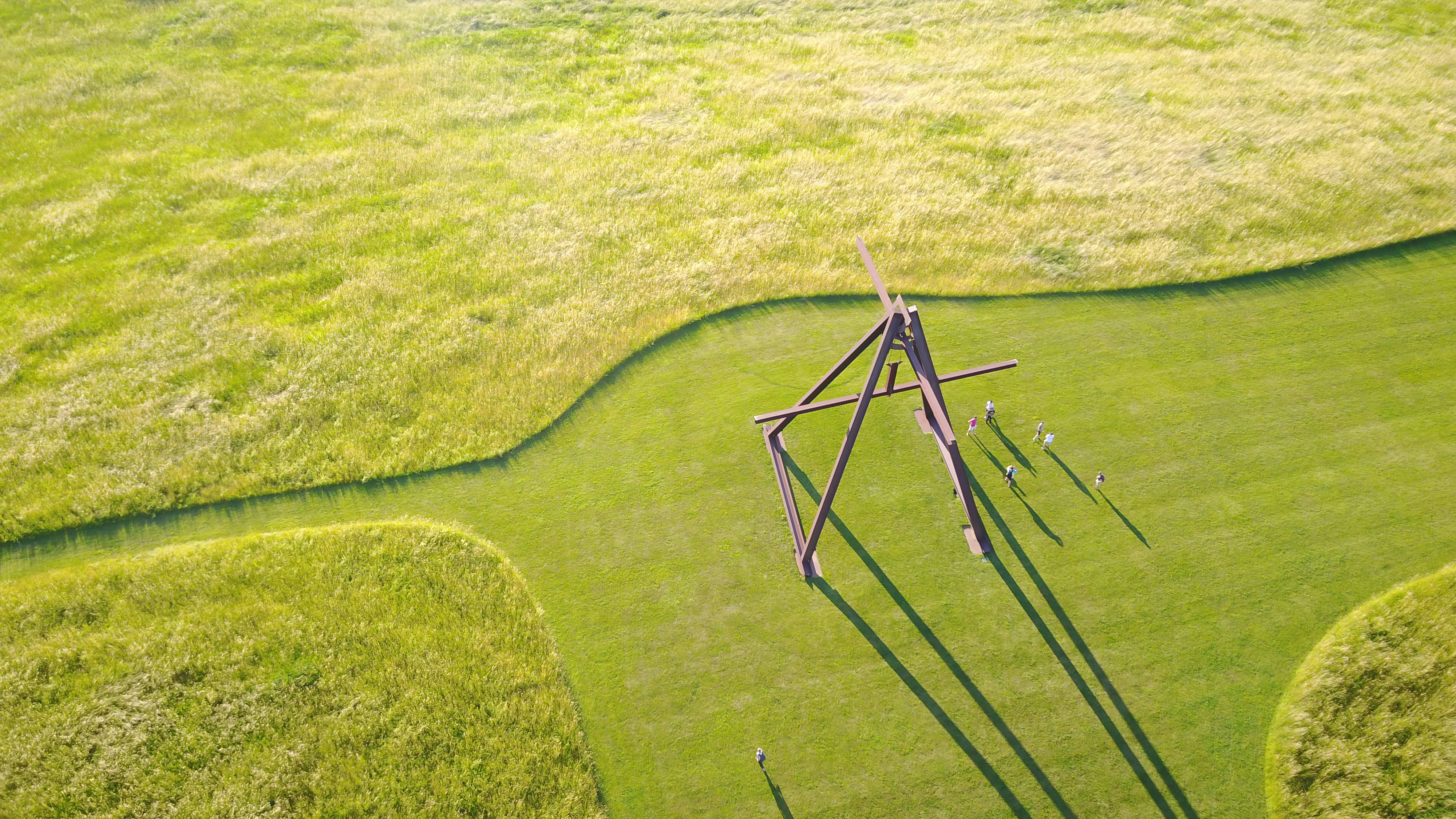 top down of steel beam scultpture, shadows fall down and to the right